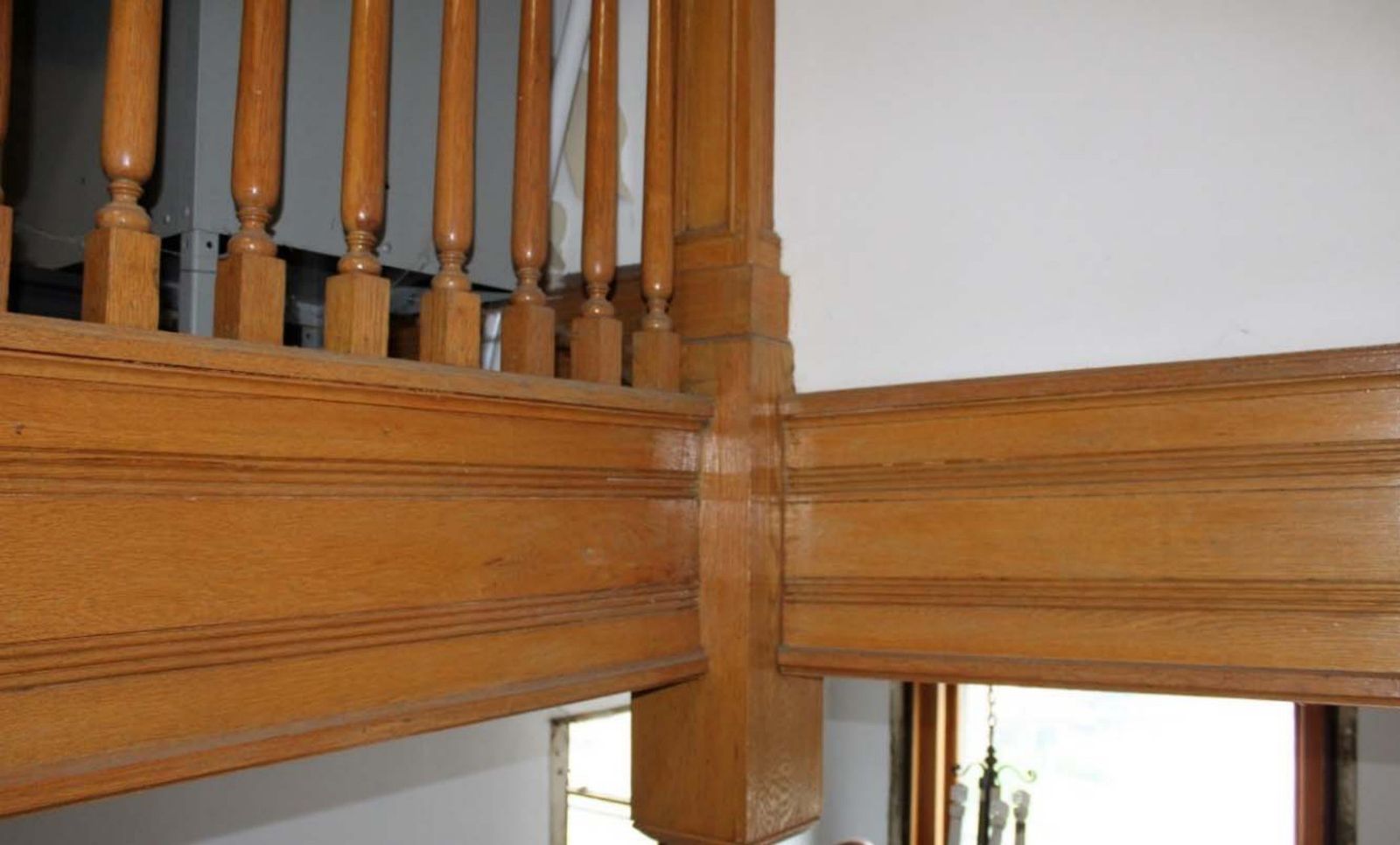 Molding and stair railing on the third floor.