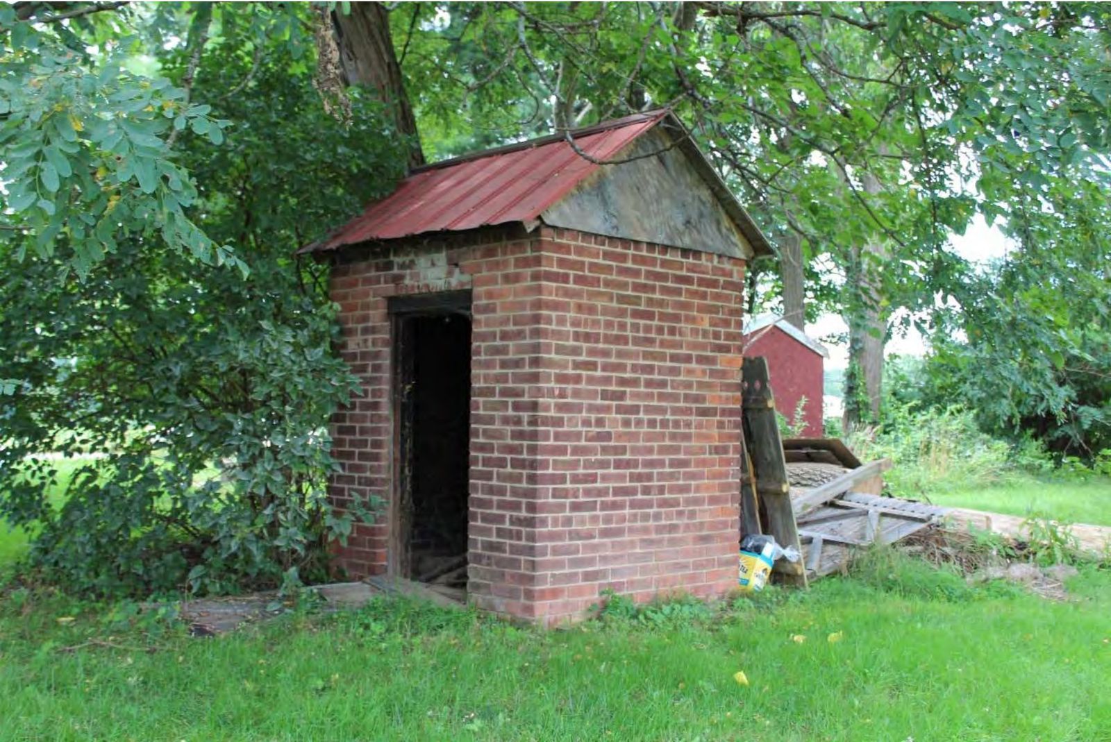 The 19th-century brick smokehouse.