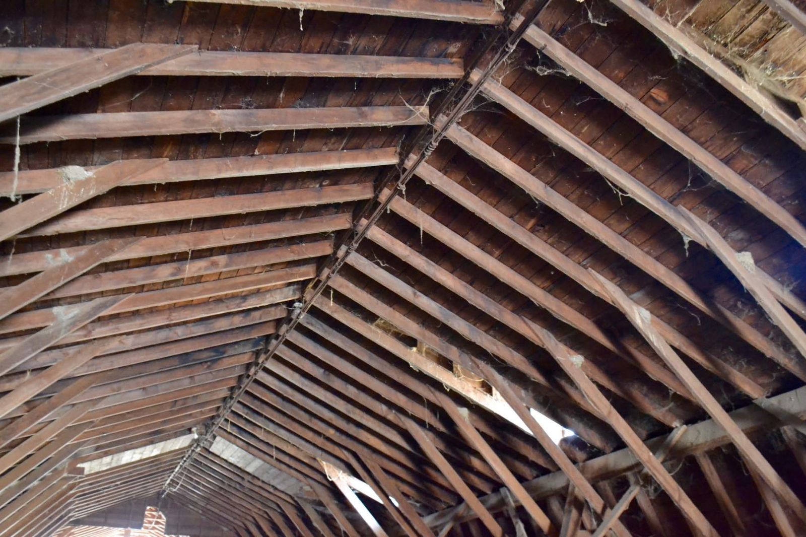 Gambrel roof framing seen from the hay loft.